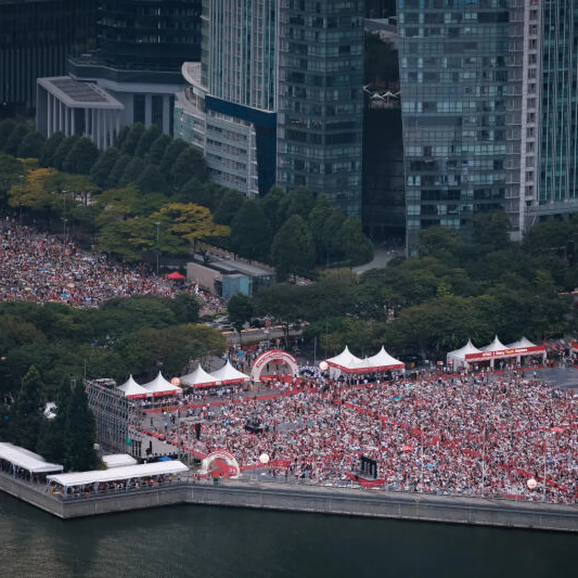 Some 7000 members of public at The Promontory @ Marina Bay for the NDP as seen from MBS SkyPark Observation Deck on Aug 9.