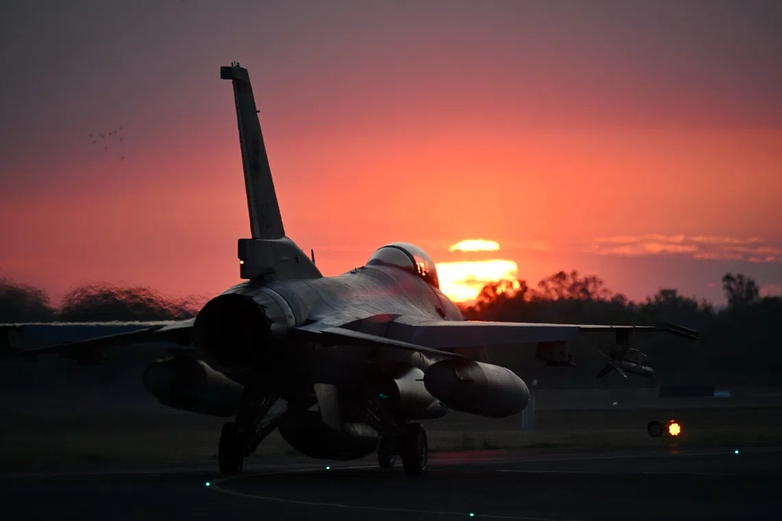 F-16 Fighting Falcon fighter plane seen at dusk during the Night Operations at the Exercise Wallaby (XWB) at Shoalwater Bay Training Area (SWBTA) in Queensland, Australia onOct 24, 2025.