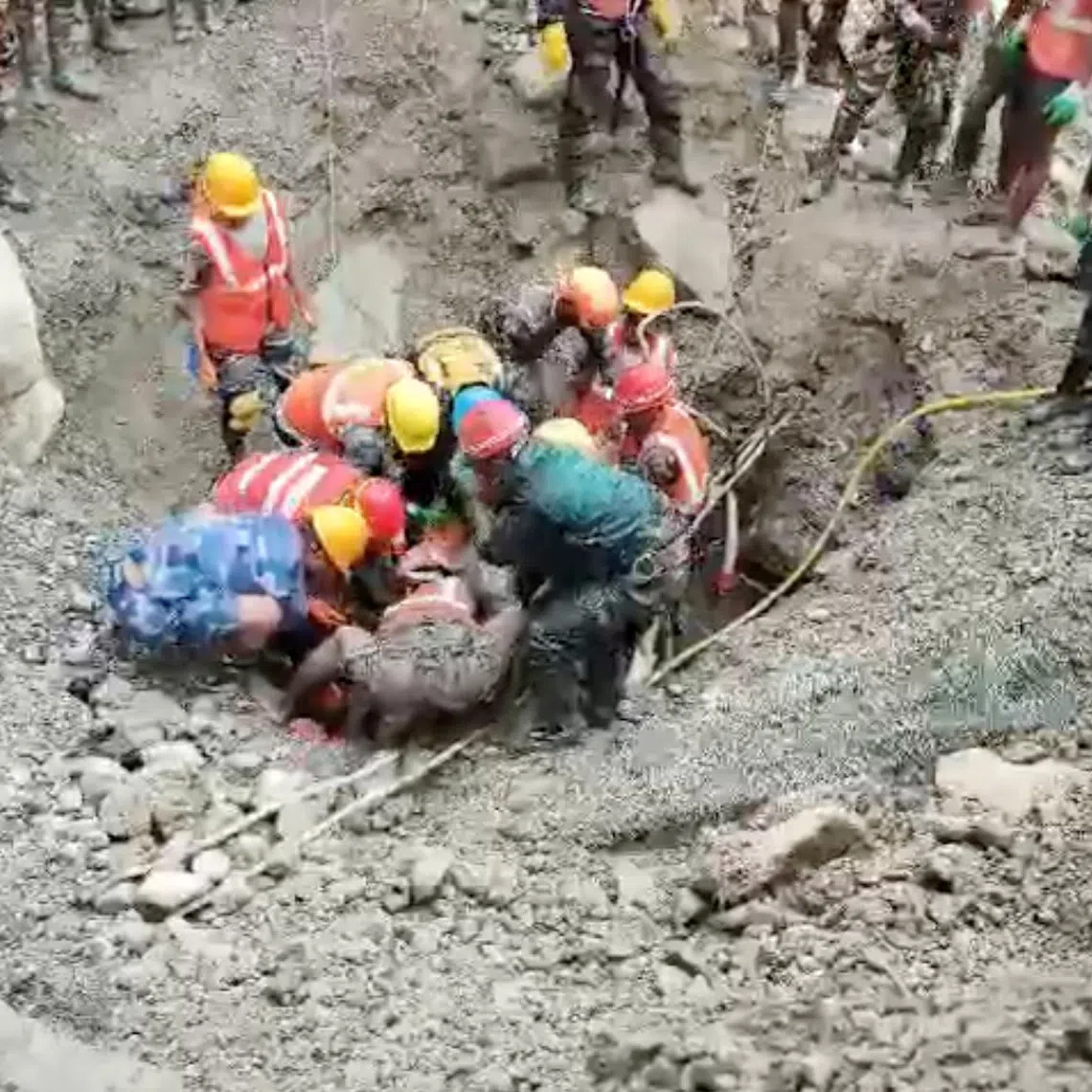 Rescuers work to pull out a survivor from a tunnel linked to a hydropower station following deadly flash floods and mudslides, at a location given as Rasuwa district, Nepal, in this still image taken from a handout video released September 4, 2026. Nepal Army/Handout via REUTERS    THIS IMAGE HAS BEEN SUPPLIED BY A THIRD PARTY. NO RESALES. NO ARCHIVES. MANDATORY CREDIT