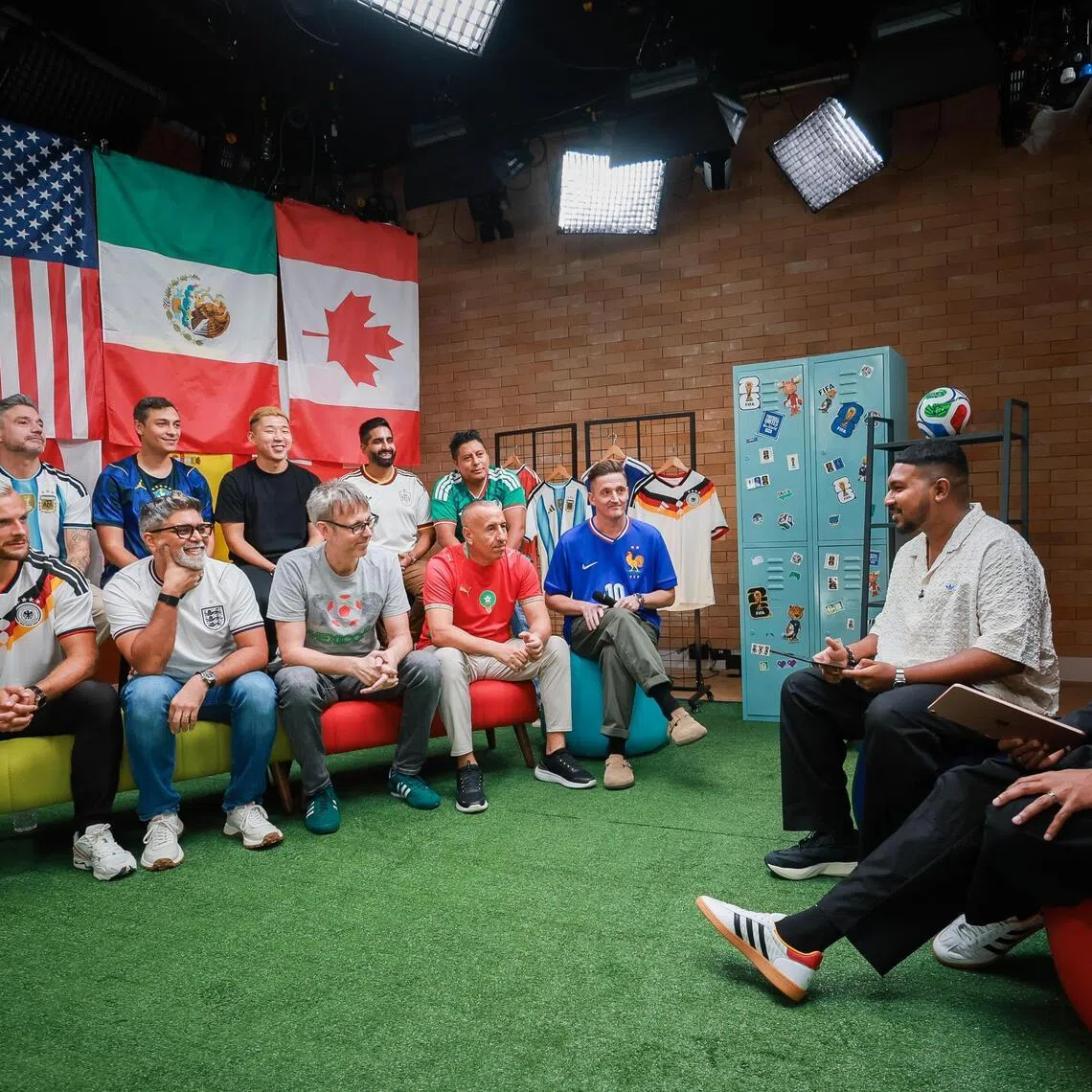 (From right) Zia-ul Raushan from Money FM 89.3 and ST sports reporter Deepanraj Ganesan hosting the World Cup Team Talk podcast show, featuring fans from participating nations, on May 22.
