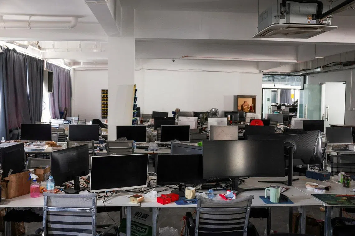Computer monitors are kept on desks inside a workstation at a compound in O'Smach that the Thai military said was used for scam operations, at the Chong Chom-O'Smach border crossing, after clashes between Thailand and Cambodia in December 2025, in Samraong, Oddar Meanchey province, Cambodia, March 6, 2026. REUTERS/Chalinee Thirasupa