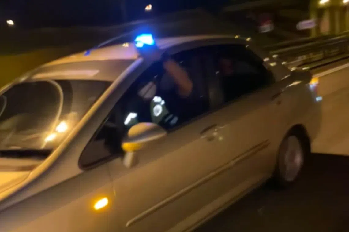 A recent viral video shows three men in an unmarked car trying to pull a driver over while flashing a blue beacon light.
