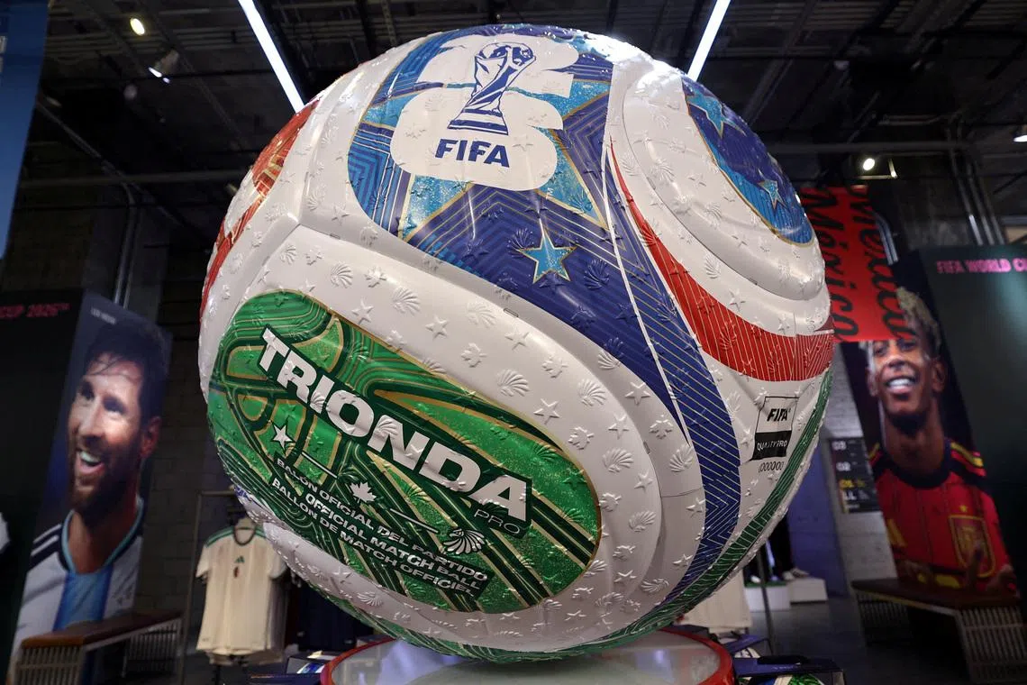 FILE PHOTO: A giant model of the official Trionda pro match ball for the FIFA 2026 World Cup is displayed inside the Adidas store in Manhattan in New York City, U.S., January 7, 2026. REUTERS/Mike Segar/File Photo