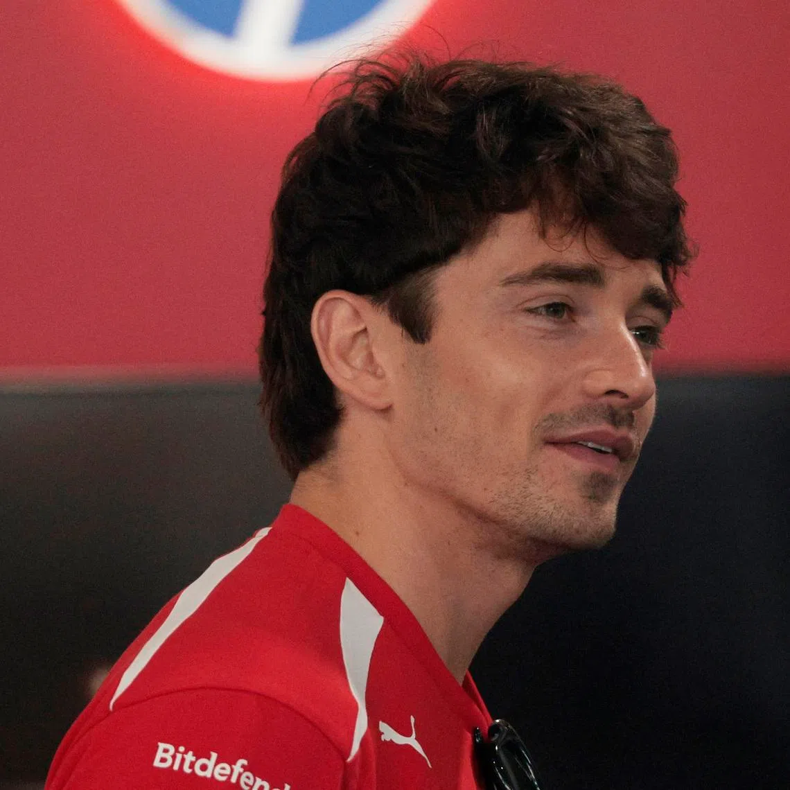Ferrari's Charles Leclerc in the garage ahead of the sprint race.