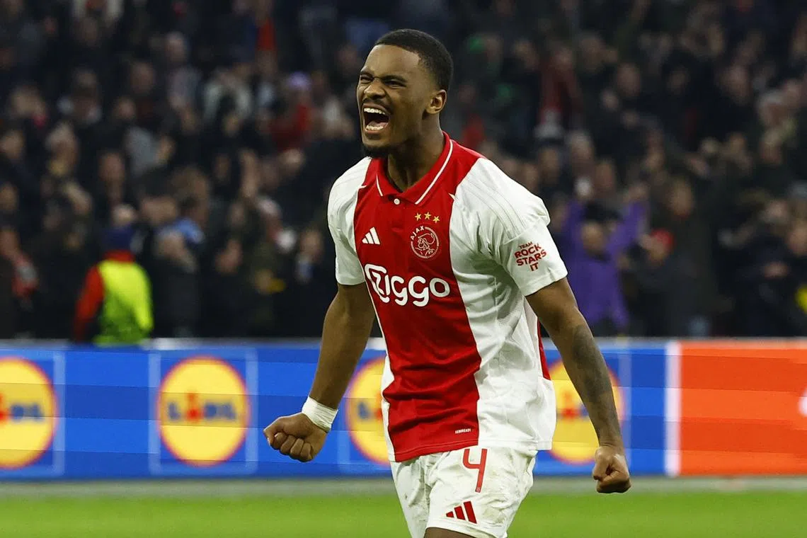 FILE PHOTO: Soccer Football - Europa League - Knockout Phase Playoff - Second Leg - Ajax Amsterdam v Union Saint-Gilloise - Johan Cruijff Arena, Amsterdam, Netherlands - February 20, 2025 Ajax Amsterdam's Jorrel Hato celebrates after the match REUTERS/Piroschka Van De Wouw/File Photo