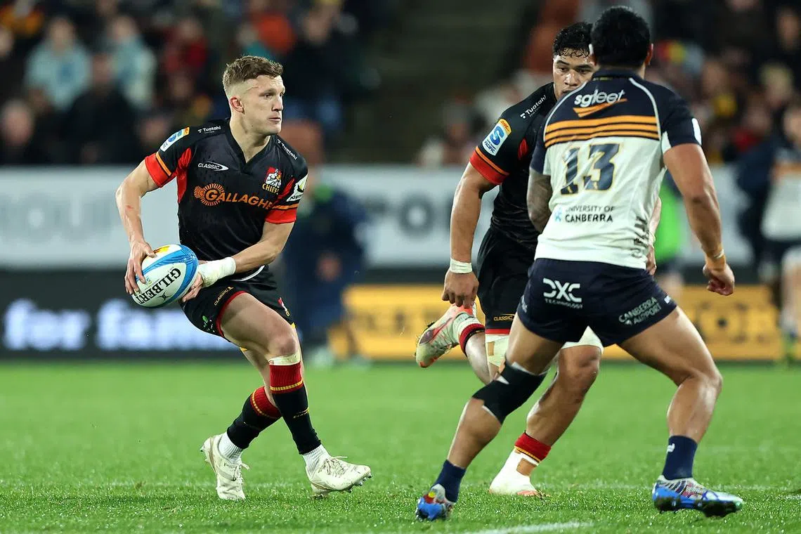 Chiefs’ Damian McKenzie looking to pass the ball in the Super Rugby Pacific semi-final against Brumbies at FMG Stadium in Hamilton on June 14, 2025.