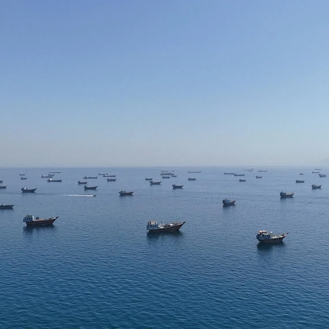 What lies beneath these ships anchored in the Strait of Hormuz is another potential chokepoint: undersea cables vital for global internet communications.