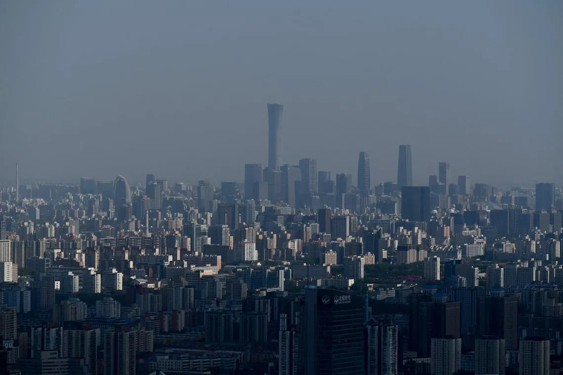 This picture shows a skyline of the Central Business District (CBD) in Beijing on April 30, 2023. (Photo by WANG Zhao / AFP)