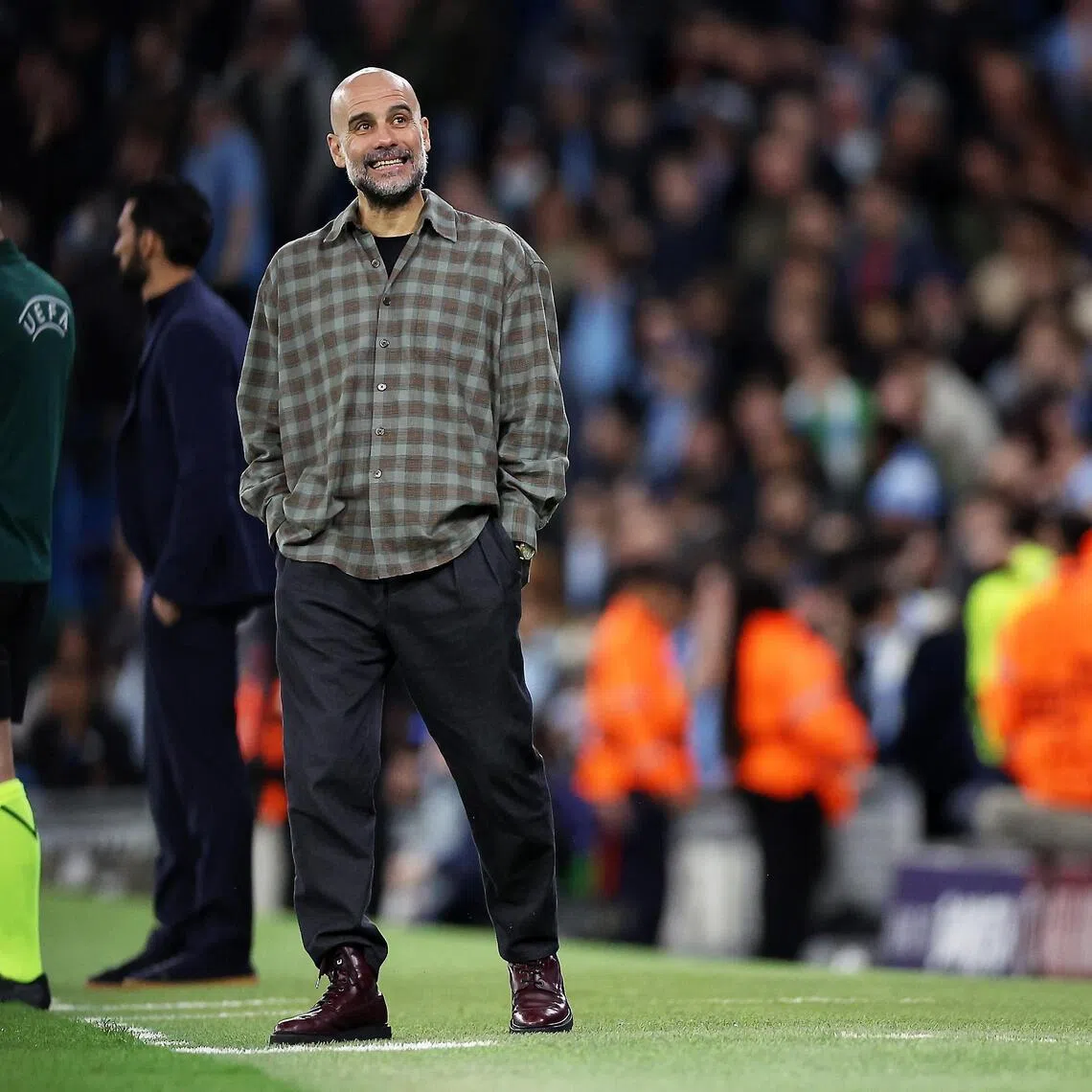 Manchester City manager Pep Guardiola watches from the touchline during the Champions League match against Real Madrid.