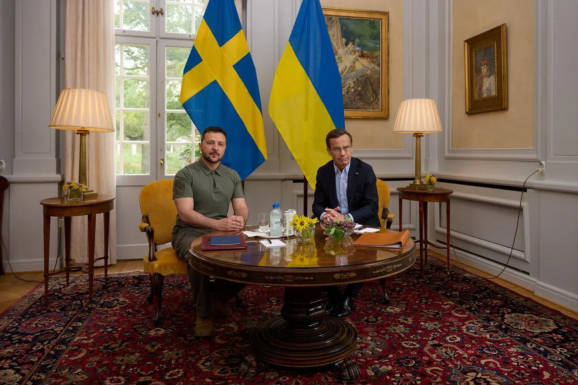 Ukrainian President Volodymyr Zelenskiy meets Swedish Prime Minister Ulf Kristersson at his country retreat in Harpsund, Sweden, August 19, 2023. Ukrainian Presidential Press Service/Handout via REUTERS/ File Photo