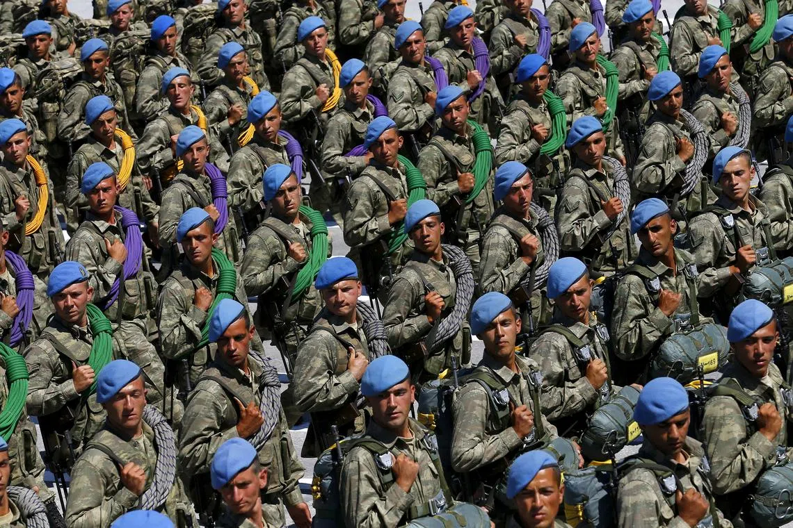FILE PHOTO: Turkish soldiers march during a parade marking the 93rd anniversary of Victory Day in Ankara, Turkey, August 30, 2015. REUTERS/Umit Bektas/File Photo