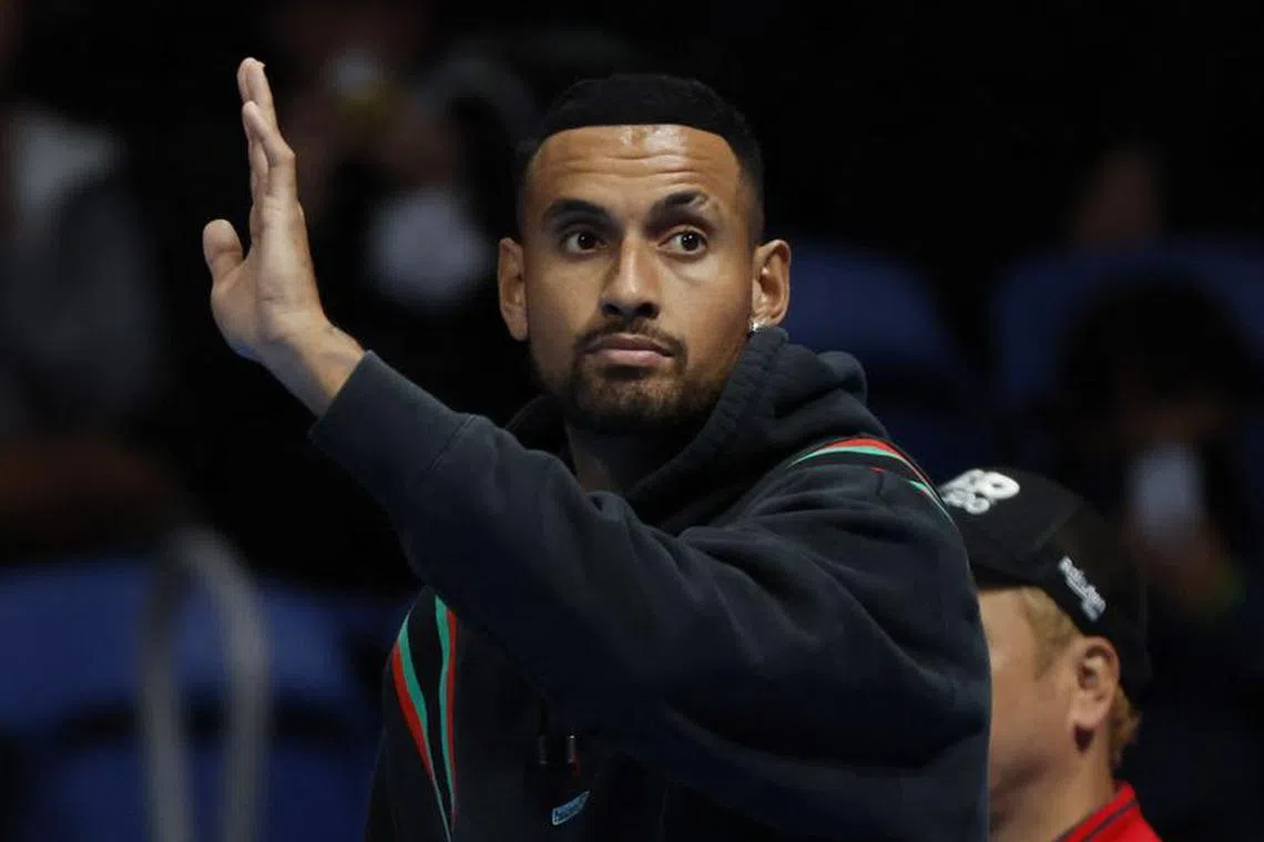 FILE PHOTO: Tennis - ATP 500 - Japan Open Tennis Championships - Ariake Coliseum, Tokyo, Japan - October 7, 2022 Australia's Nick Kyrgios waves to fans after withdrawing from his quarter final match against Taylor Fritz of the U.S. due to injury REUTERS/Androniki Christodoulou/File Photo