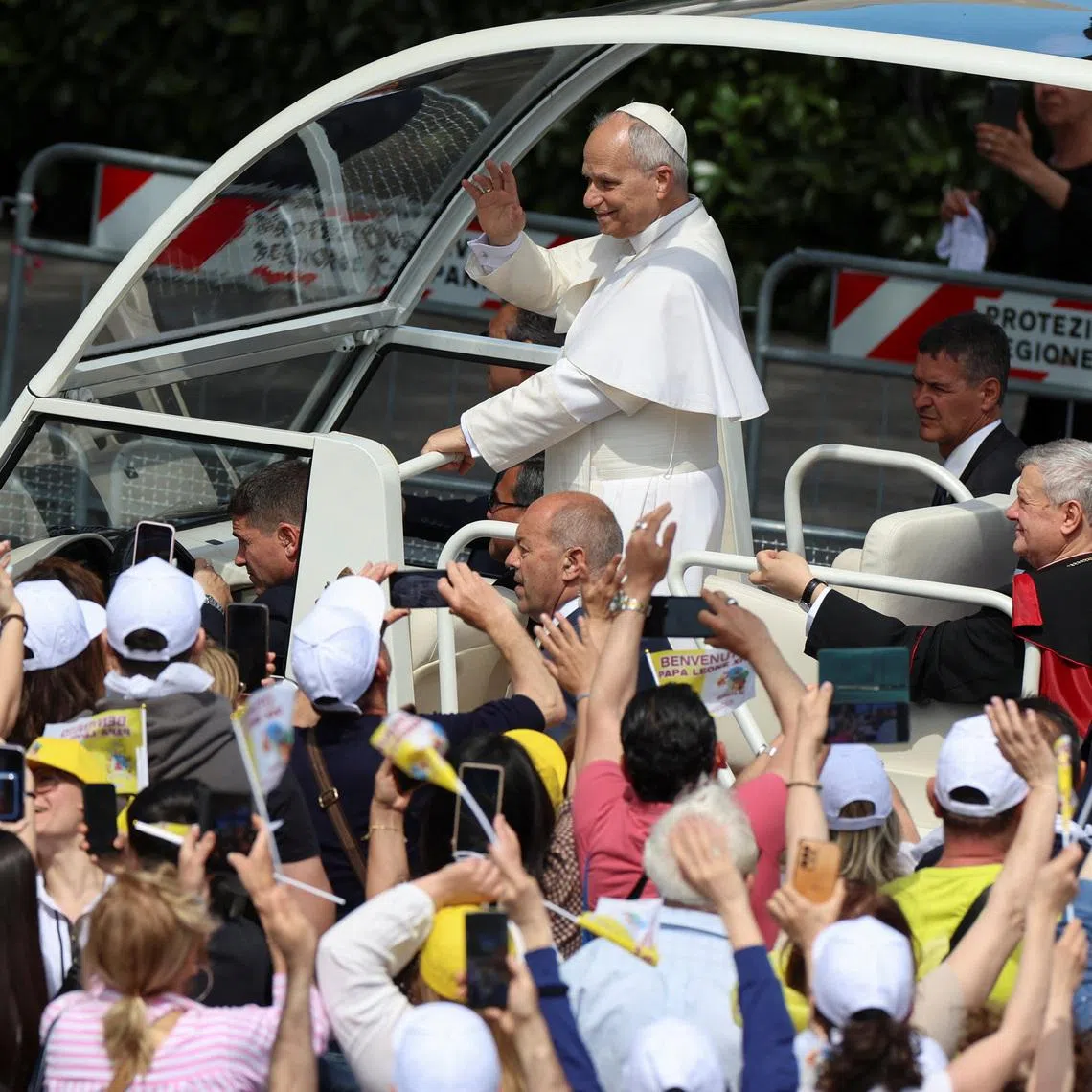 Pope Leo arriving for a meeting with mayors and faithful of various municipalities of the so-called "Land of Fires," an area long plagued by illegal toxic waste dumping and burning, in Acerra, Italy, on May 23.