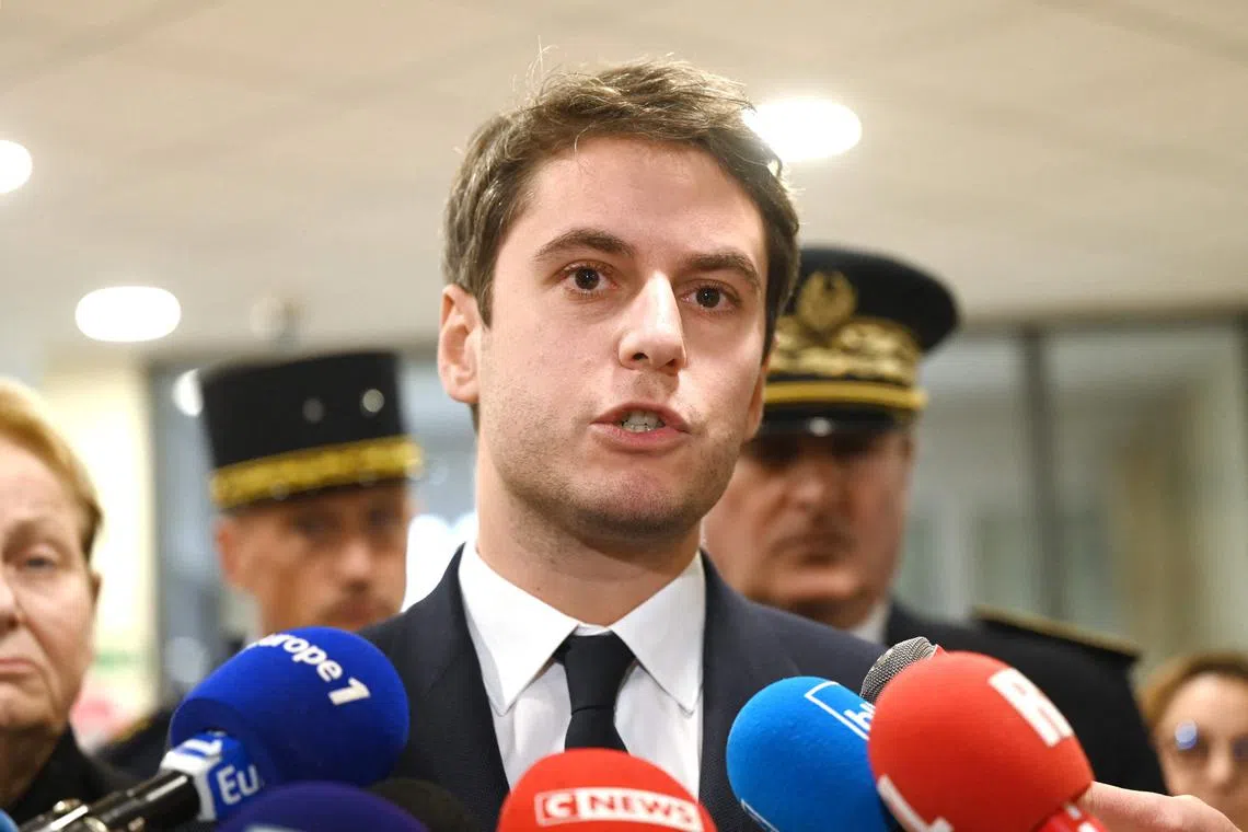 French Junior Minister for Public Accounts Gabriel Attal speaks to the media, following the death of a tax inspector.