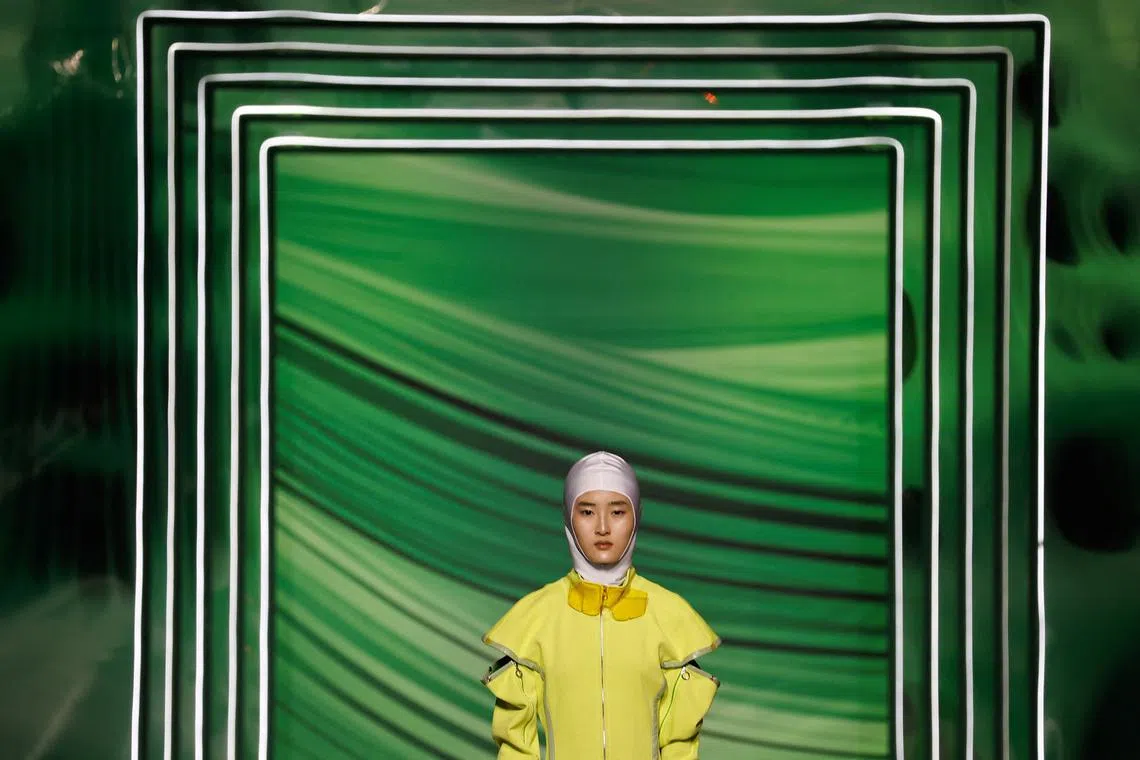 A model presenting a creation at the D.MARTINA QUEEN Spring/Summer 2024 collection show by Ding Jie on Sept 9.