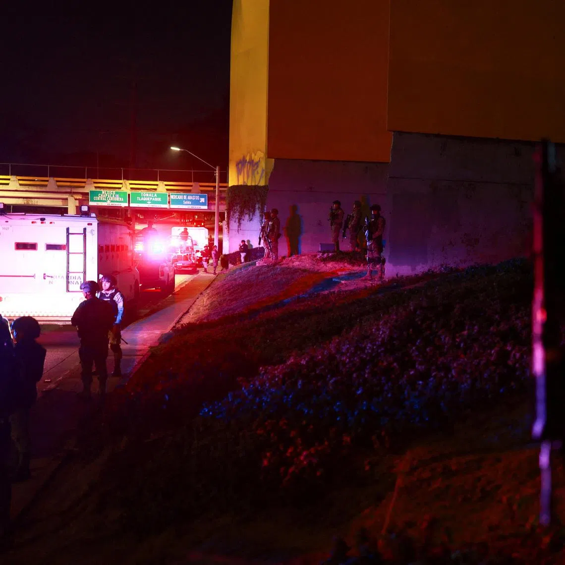 Members of the Mexican army and the National Guard stand guard at a roundabout on a main avenue, following a military operation in which Mexican officials said cartel boss Nemesio Oseguera, \"El Mencho,\" was killed in Jalisco state, in Guadalajara, Mexico, February 23, 2026. REUTERS/Jose Luis Gonzalez