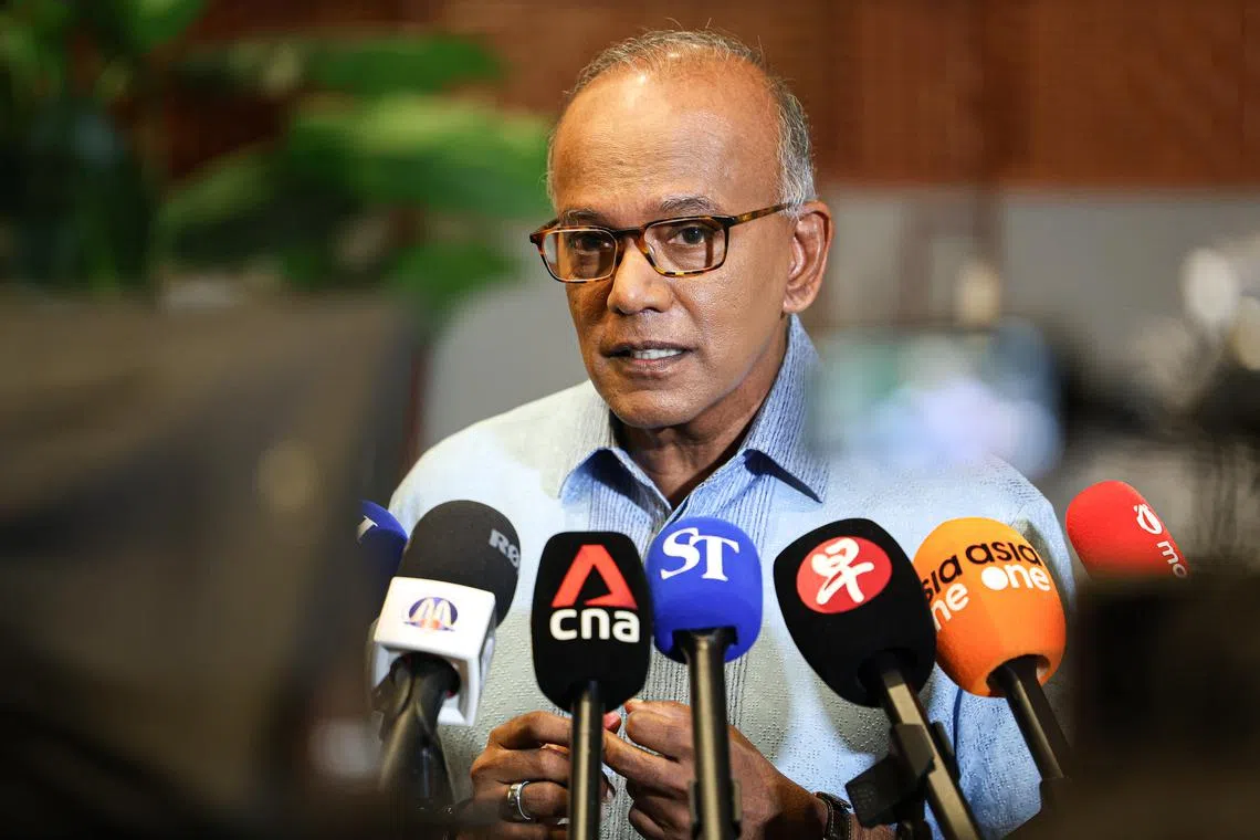 Singapore’s Home Affairs Minister K. Shanmugam speaking to the media on Sept 12 at Laguna National Golf Resort Club.