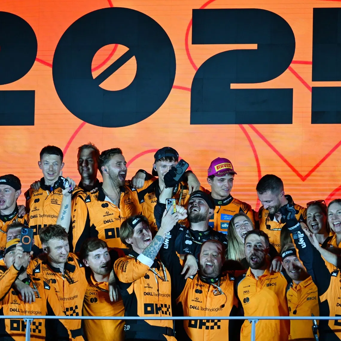 McLaren's Formula 1 Team celebrating their Constructors Championship at the 2025 Formula One Singapore Airlines Singapore Grand Prix on Oct 5.