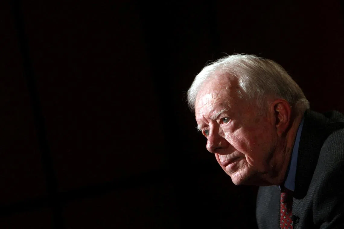 FILE PHOTO: Former U.S. President Jimmy Carter attends an interview with Reuters in Cairo, Egypt, January 12, 2012.  REUTERS/Amr Abdallah Dalsh/File Photo