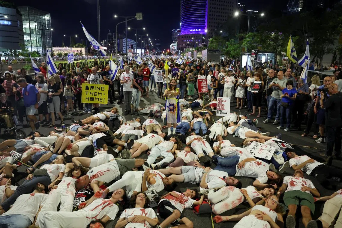 People protesting against Israeli Prime Minister Benjamin Netanyahu's government and calling for the release of hostages kidnapped by Hamas, in Tel Aviv on June 1.