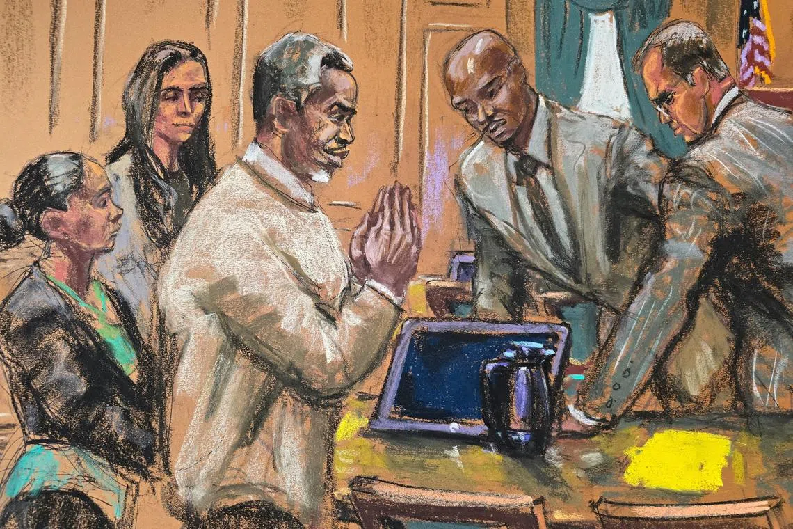 FILE PHOTO: Sean "Diddy" Combs gestures as he speaks with his defense team before the day's session of his sex trafficking trial in New York City, New York, U.S., June 18, 2025 in this courtroom sketch. REUTERS/Jane Rosenberg/File Photo