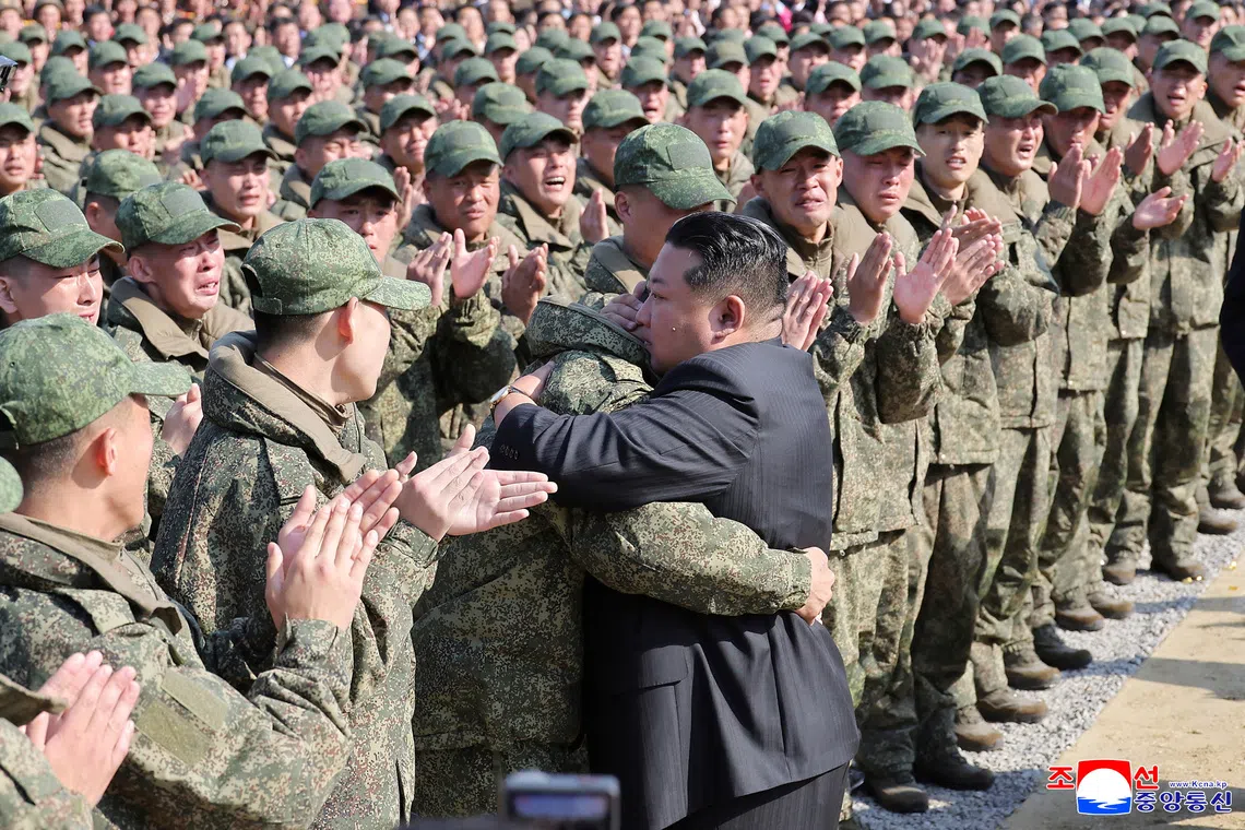 North Korean leader Kim Jong Un greets attendees at the groundbreaking ceremony for the Overseas Military Operations Battle Merit Memorial Hall, for North Korean soldiers who fought alongside Russia in Kursk regions, in Pyongyang, North Korea. via KCNA