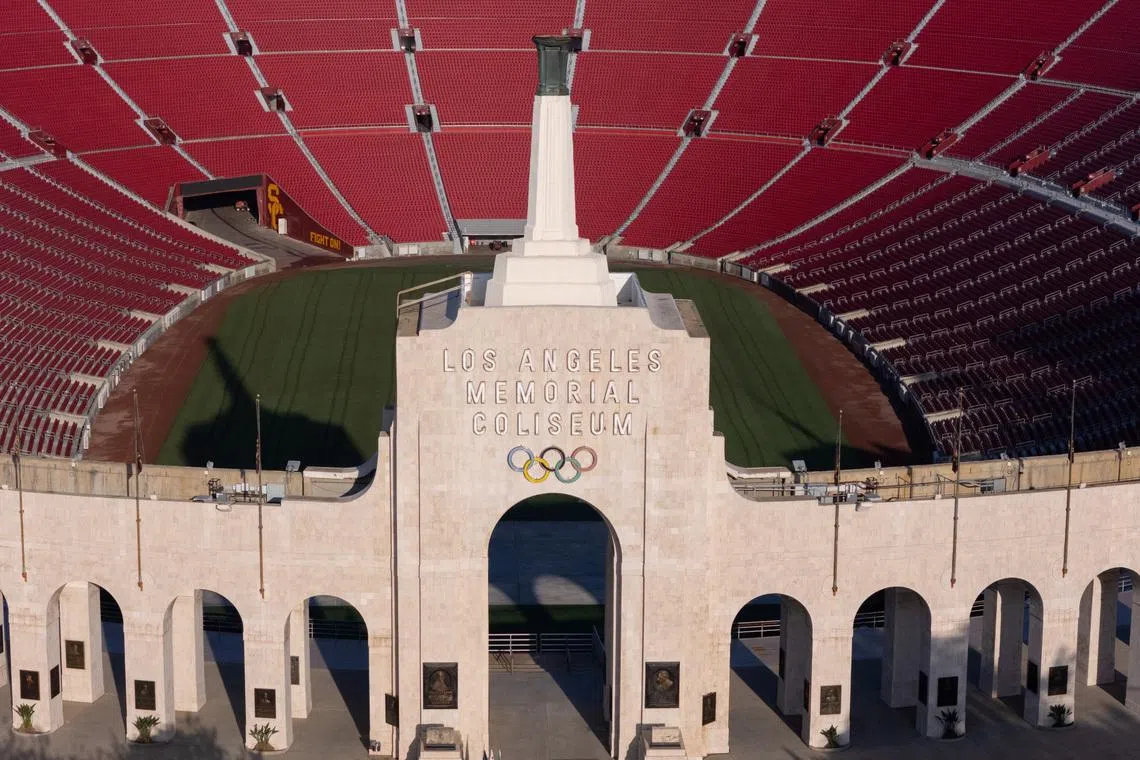 A drone view of Los Angeles Coliseum, as it was announced it will host the opening ceremonies of the 2028 Olympics along with SoFi Stadium in a dual event, closing ceremony, and host the opening of the Paralympic Games in 2028, making it the first facility to host events for 3 Olympic Games in Los Angeles, California, U.S., May 8, 2025. REUTERS/Mike Blake