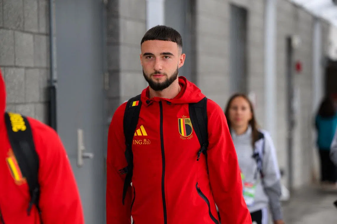 Jun 8, 2026; Seattle, Washington, USA; Belgium men's national team player Zeno Debast arrives for the 2026 FIFA World Cup at Seattle-Tacoma International Airport. Mandatory Credit: Steven Bisig-Imagn Images