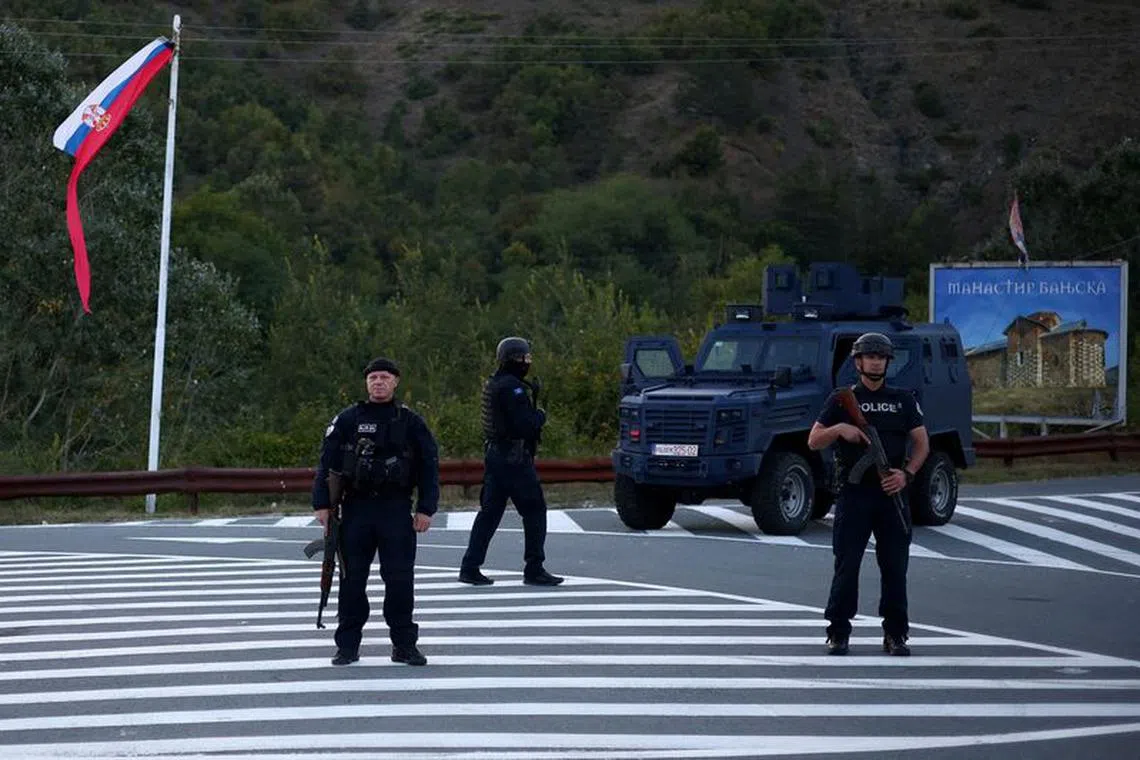 FILE PHOTO: Kosovo special police officers patrol a road to Banjska monastery, in the aftermath of a shooting incident, near Zvecan, Kosovo September 26, 2023. REUTERS/Florion Goga/File Photo