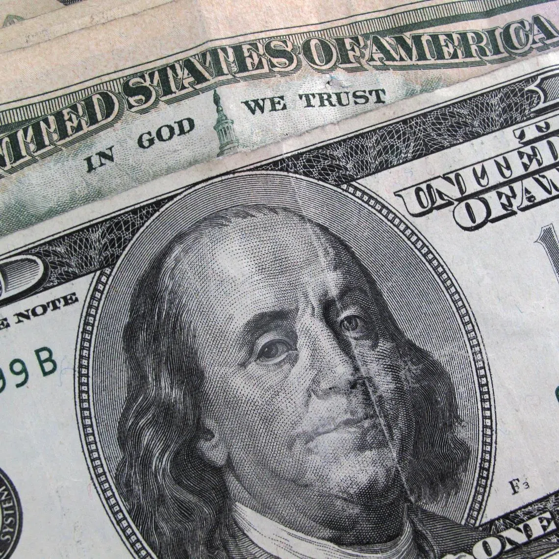 Traditionally US paper currency contains the signature of the treasury secretary and the US treasurer.
