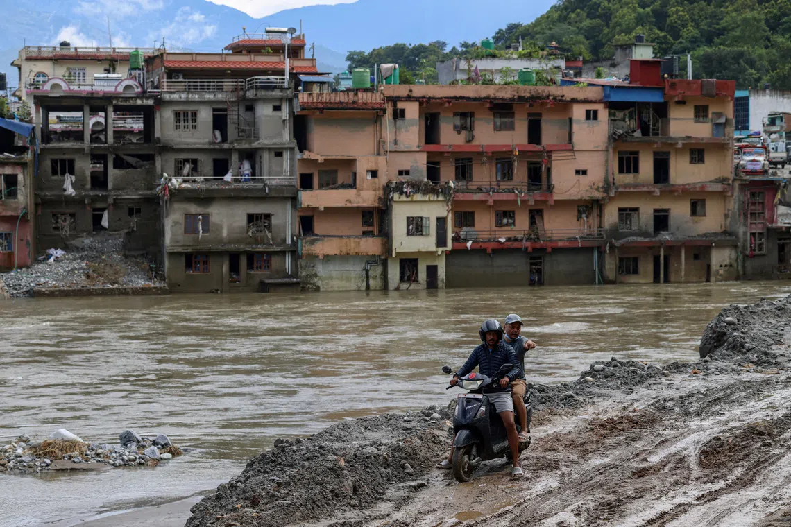 In a Nepal town, flood survivors find little trace of former lives