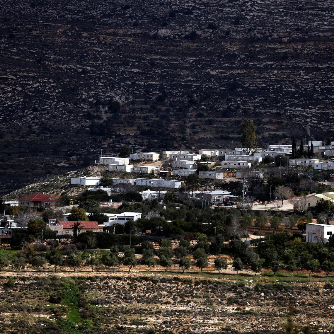 A view shows homes in the Jewish settlement of Givat Harel, taken from the Jewish settlement of Givat Haroeh in the Israeli-occupied West Bank, February 21, 2023. REUTERS/Ronen Zvulun