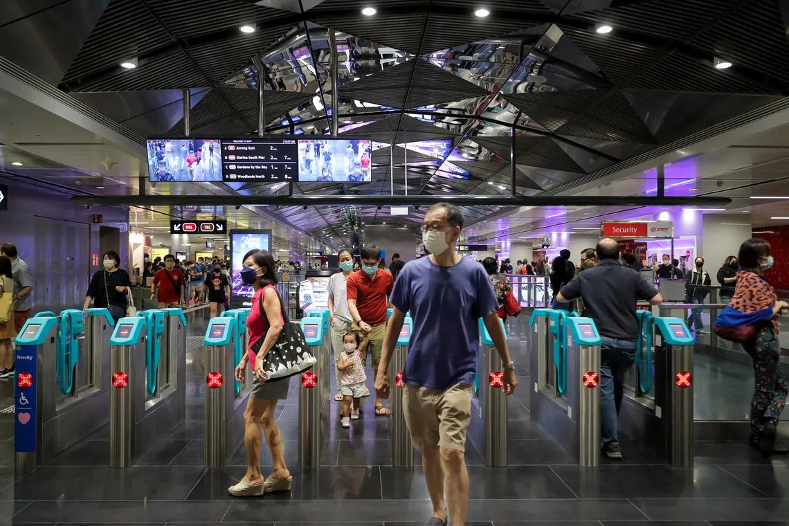 Commuters at the Thomson-East Coast Line Orchard Station, 11 Nov 2022.