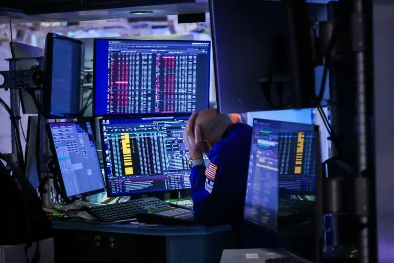 A trader works during the Beta Technologies' IPO on the floor at the New York Stock Exchange in New York, on Nov 4.