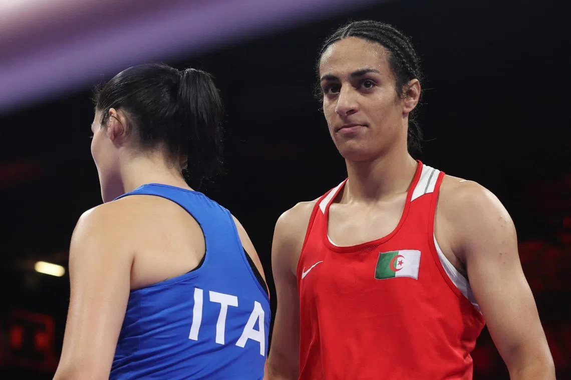 Paris 2024 Olympics - Boxing - Women's 66kg - Prelims - Round of 16 - North Paris Arena, Villepinte, France - August 01, 2024. Imane Khelif of Algeria and Angela Carini of Italy react after their fight. REUTERS/Isabel Infantes