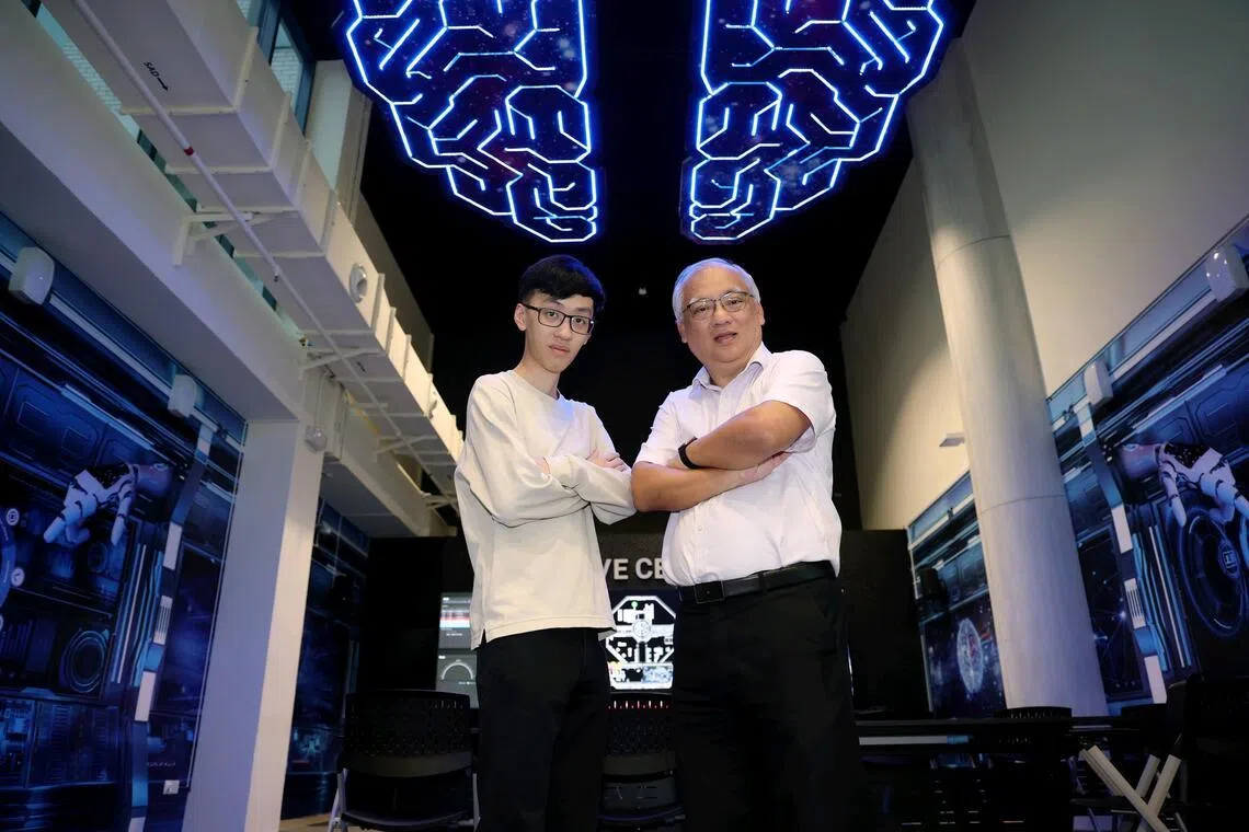 Profile of Mr Tay Tse Wan (right), 60, branch manager (South Asia Pacific Region), and his son Tay Quan Kai, 23, a Temasek Polytechnic alumnus, at Temasek Polytechnic's Advanced Manufacturing Centre on April 7, 2026. They are both pursuing a Specialist Diploma in AI Solutions Development at TP.