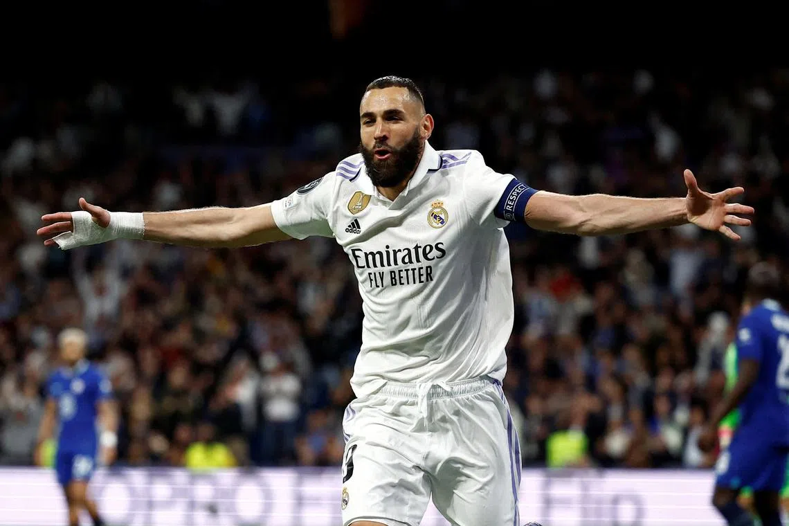 Real Madrid's Karim Benzema celebrates scoring their first goal. 