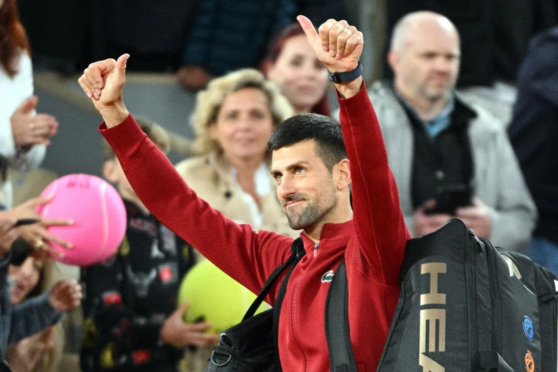epa11380017 Novak Djokovic of Serbia reacts after winning his Men's Singles 2nd round match against Roberto Carballes Baena of Spain during the French Open Grand Slam tennis tournament at Roland Garros in Paris, France, 30 May 2024.  EPA-EFE/CAROLINE BLUMBERG