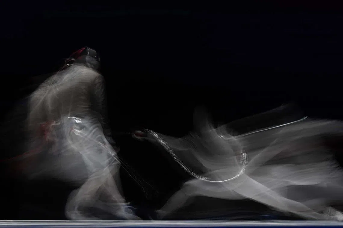 South Korea’s Gu Bongil (left) competes against Kuwait’s Yousiff Alshamlan in the men’s Sabre individual semifinals fencing event during the Hangzhou 2022 Asian Games in Hangzhou, in China's eastern Zhejiang province on Sept 25.