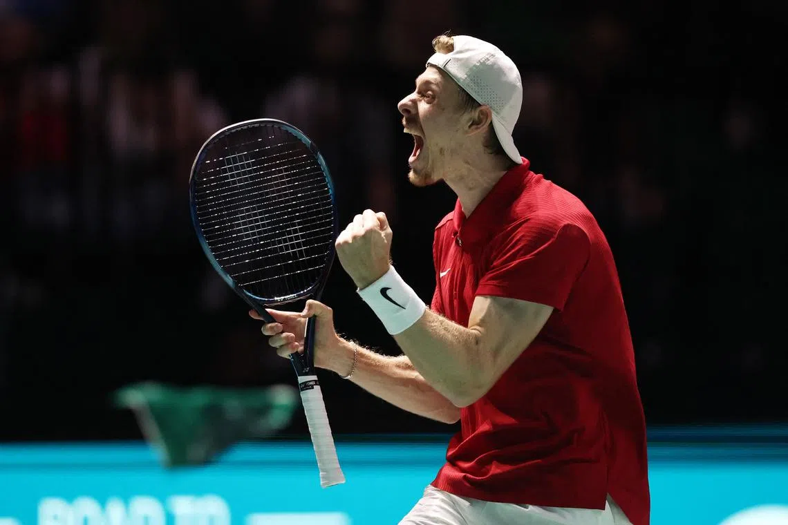 Canada's Denis Shapovalov celebrates winning his singles match against Britain's Daniel Evans.