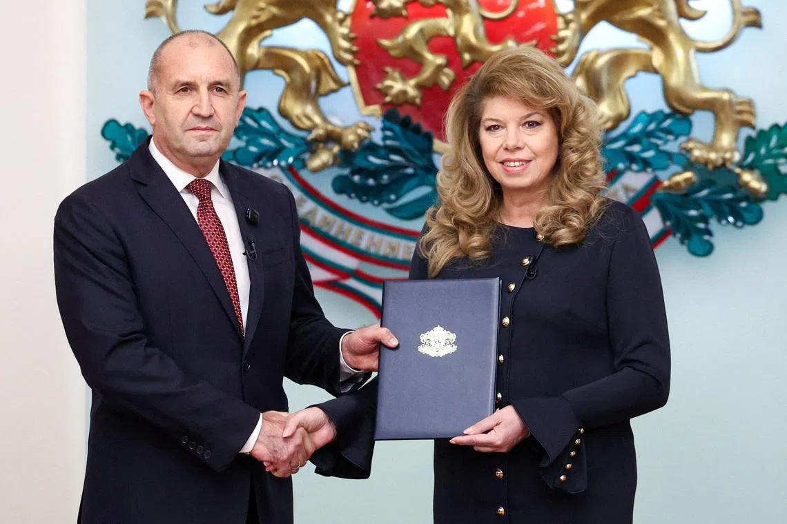 Bulgarian President Iliana Iotova gives a mandate to Rumen Radev, leader of Bulgaria's largest political coalition \"Progressive Bulgaria\" and former Bulgarian president, to form a new government, in Sofia, Bulgaria, May 7, 2026. REUTERS/Spasiyana Sergieva