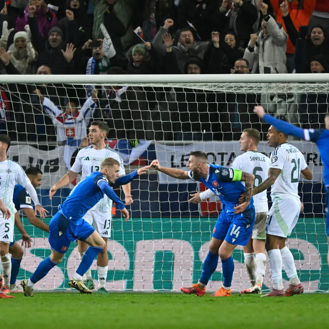 Soccer Football - World Cup - UEFA Qualifiers - Group A - Slovakia v Northern Ireland - Kosicka Futbalova Arena, Kosice, Slovakia - November 14, 2025 Slovakia's Robert Bozenik celebrates scoring their first goal REUTERS/Radovan Stoklasa