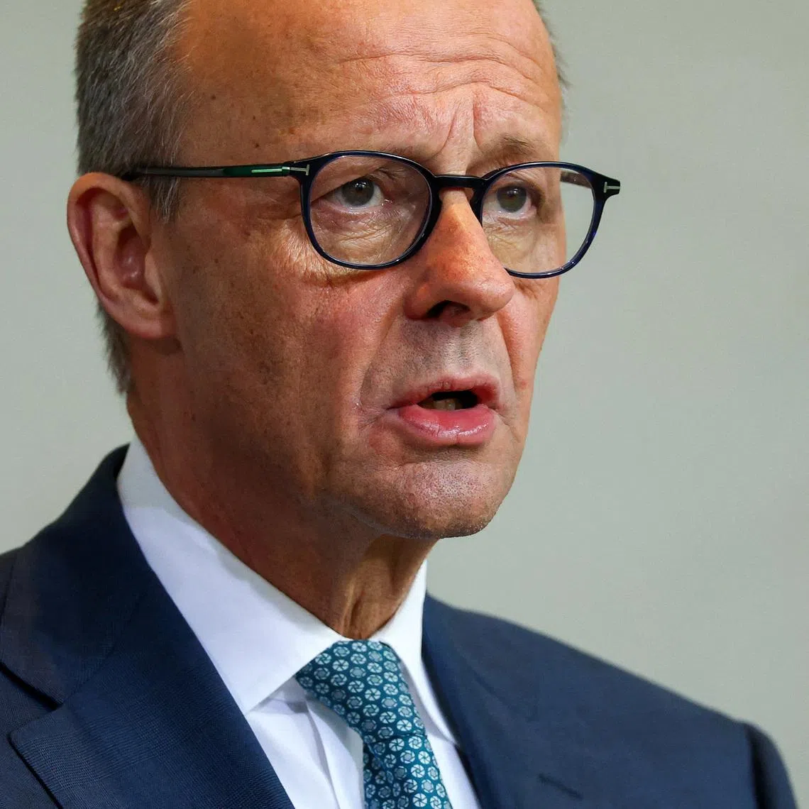 German Chancellor Friedrich Merz speaks during a press conference with Syrian President Ahmed al-Sharaa (not pictured), at the Chancellery, in Berlin, Germany March 30, 2026. REUTERS/Lisi Niesner