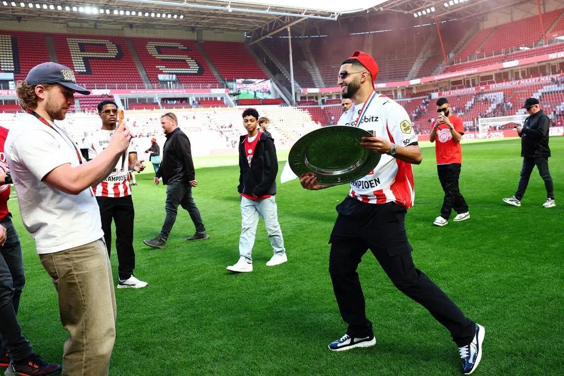Ismael Saibari with the Eredivisie trophy he won with PSV Eindhoven. After his most prolific season yet with 19 goals and nine assists in 37 games, he is now set for a move to German giants Bayern Munich.