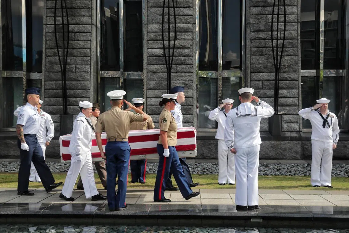 A repatriation transferring ceremony at the US Embassy in Singapore on May 2, 2023 to formally mark the start of the journey home for the remains of 11 American servicemen lost in World War II, when their B-24 bomber was shot down by the Japanese. The remains will now be transported to Hawaii to begin the arduous process of trying to identify them. 