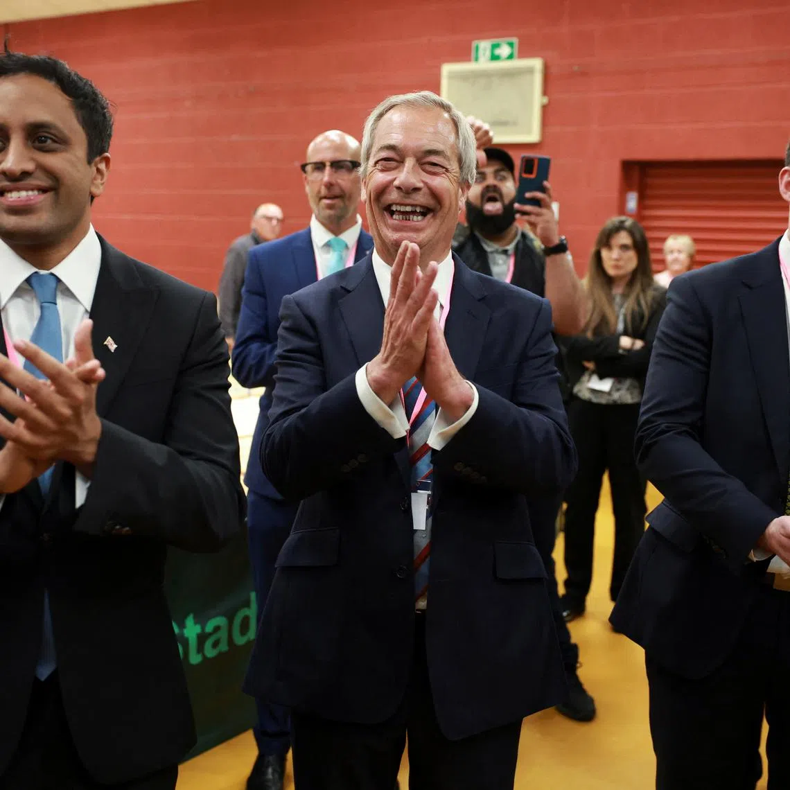 Reform party leader Nigel Farage celebrates as the party wins the Runcorn and Helsby by-election results at Halton Stadium in Widnes, Britain, May 2, 2025. REUTERS/Phil Noble