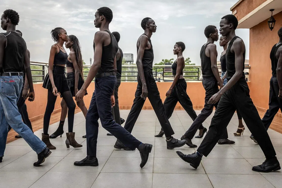 Professional models from the Juba-based modelling agency Jubalicious practise catwalking in Juba, South Sudan, on Feb 20.