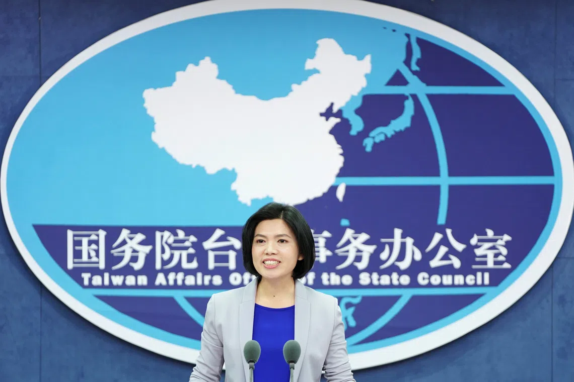 Zhu Fenglian, the new spokesperson for China's Taiwan Affairs Office of the State Council, speaks at a news conference in Beijing, China November 27, 2019. REUTERS/Stringer