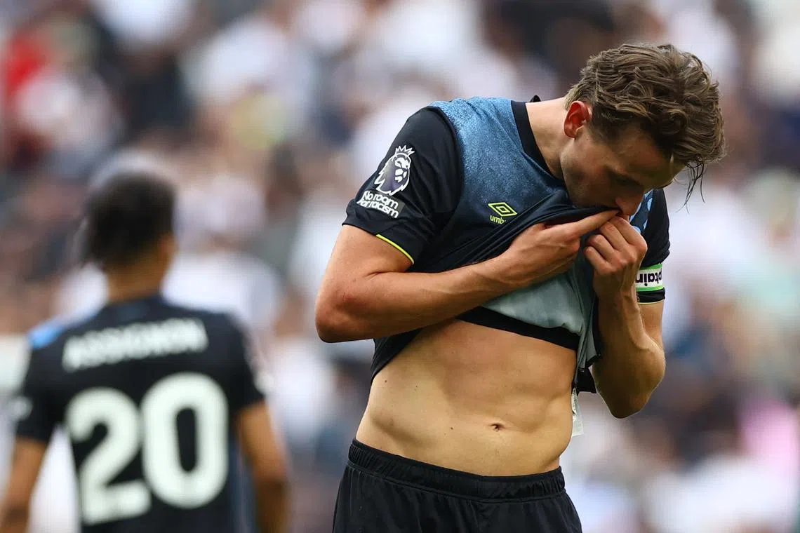 FILE PHOTO: Soccer Football - Premier League - Tottenham Hotspur v Burnley - Tottenham Hotspur Stadium, London, Britain - May 11, 2024 Burnley's Sander Berge looks dejected after the match as Burnley are relegated from the Premier League Action Images via Reuters/Matthew/File photo