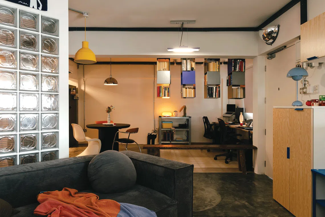 This funky industrial-themed Housing Board flat has an open-plan layout.